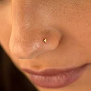 Gold tone  heart nose ring